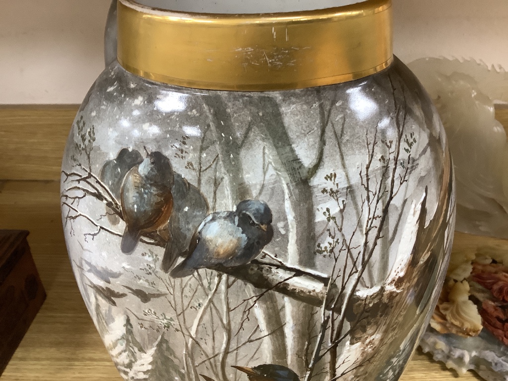 A pair of late 19th century French St Denis painted vases, decorated with birds in a landscape, signed by the artist, height 35cm